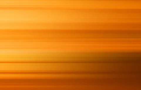 Abstrakte Fläche aus horizontalen, verwischten Streifen in Orange- und Gelbtönen, nach oben heller, unten dunkler werdend.