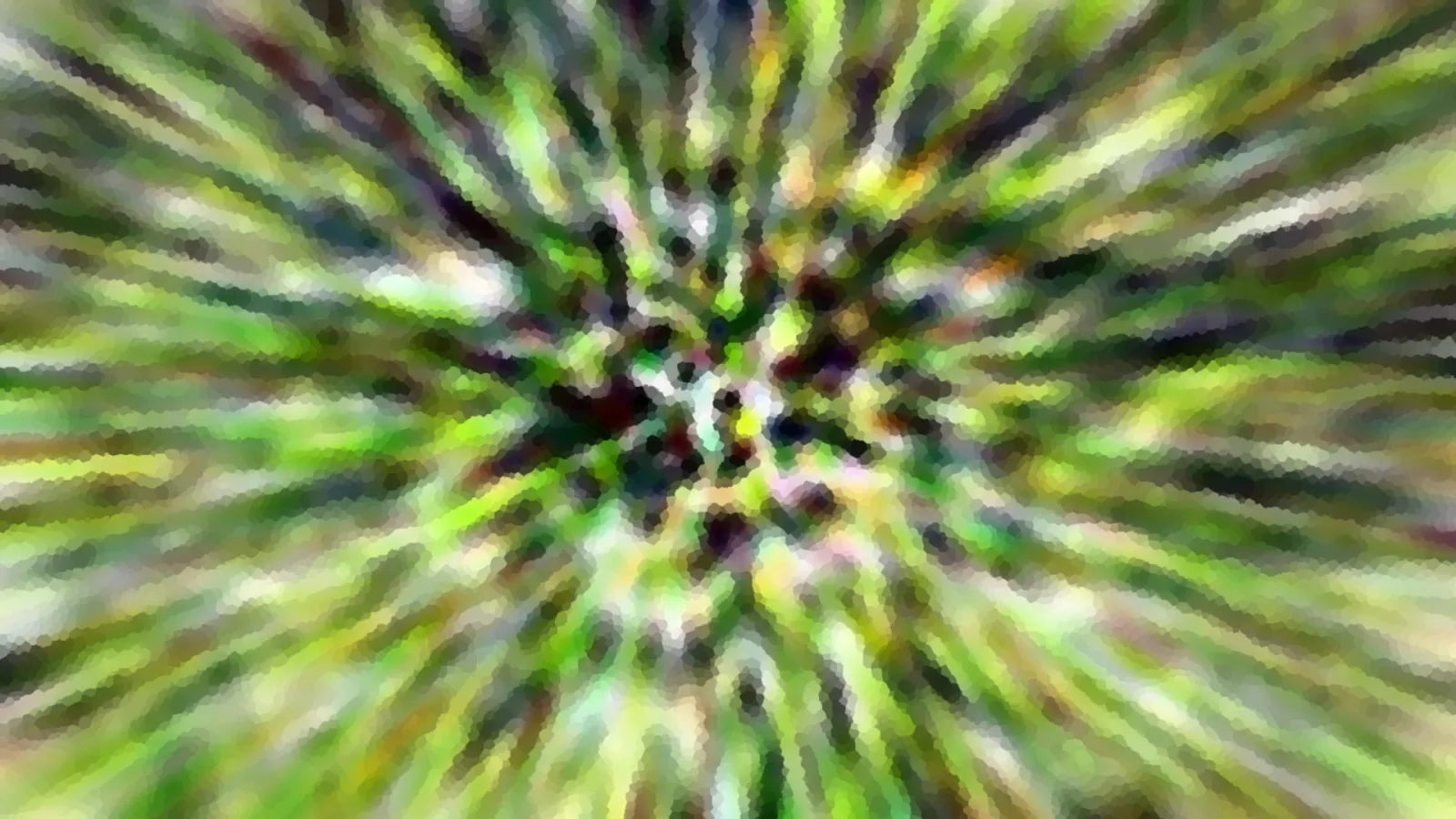 Abstrakte Aufnahme mit grünen und dunklen Streifen, die von einem Zentrum in der Bildmitte radial nach außen strahlen, mosaikartig verpixelt.
