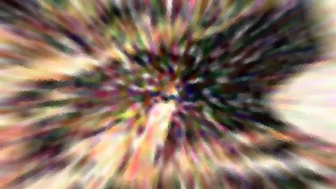 Abstraktes Bild mit bunten Streifen, die von einem hellen Zentrum radial nach außen verlaufen.