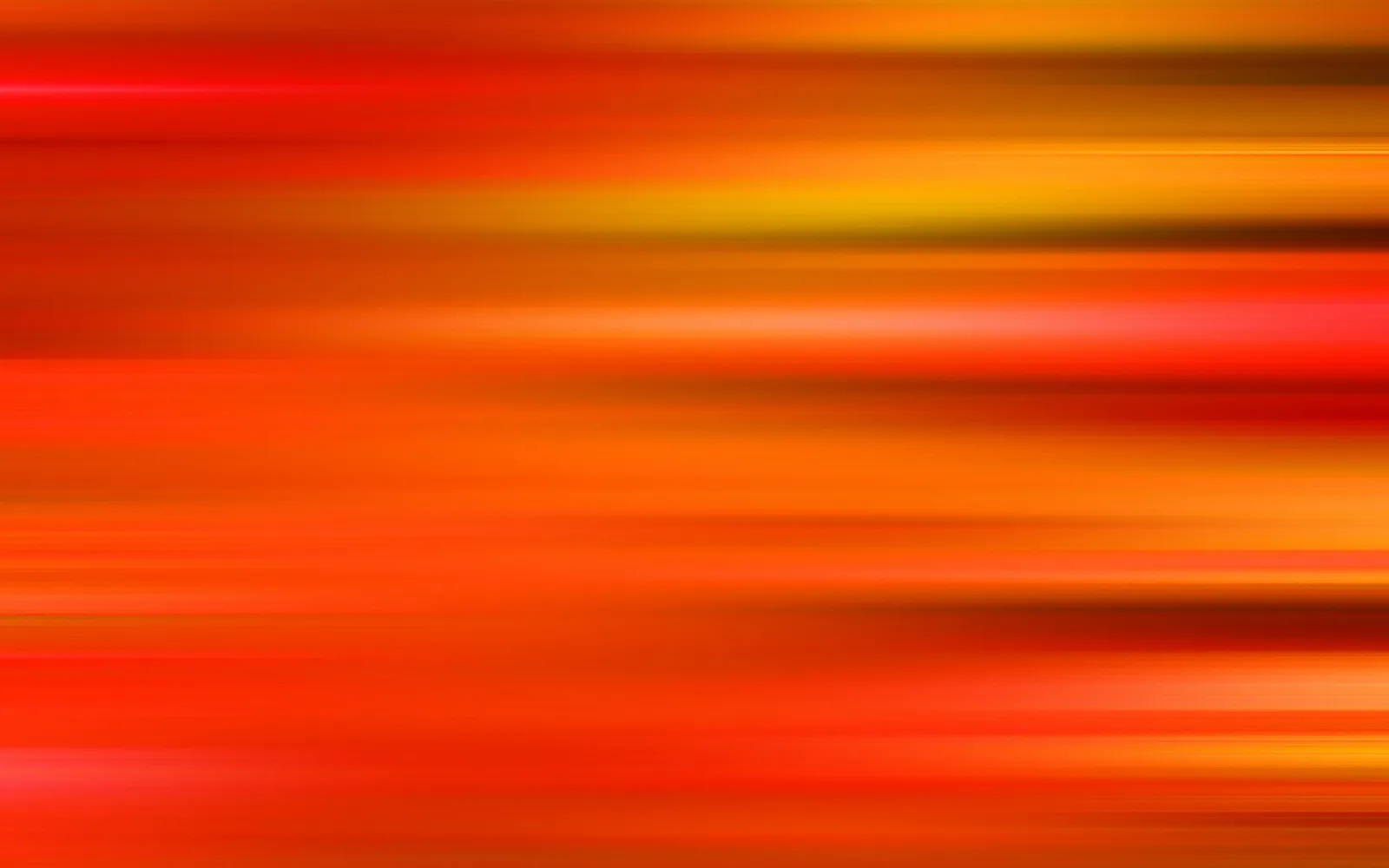 Horizontale, verschwommene Streifen in Rot, Orange und Gelb, die wie Bewegungsspuren über die ganze Fläche laufen.