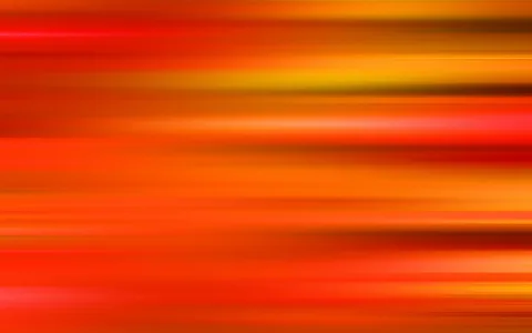 Horizontale, verschwommene Streifen in Rot, Orange und Gelb, die wie Bewegungsspuren über die ganze Fläche laufen.