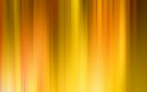 Abstrakte, senkrechte Streifen in Gelb, Orange und Braun, die weich ineinander übergehen.