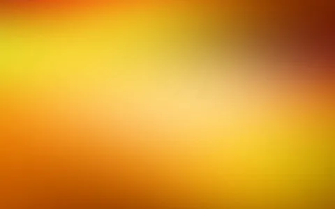 Unscharfer Farbverlauf von Gelb über Orange bis Dunkelrot, diagonal von links oben nach rechts unten.