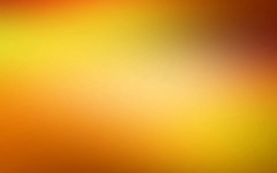 Unscharfer Farbverlauf von Gelb über Orange bis Dunkelrot, diagonal von links oben nach rechts unten.