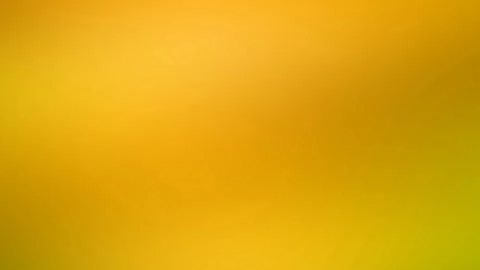 Weicher Farbverlauf von Gelb über Orange bis zu einem grünlichen Gelb am unteren rechten Rand, ohne erkennbare Motive.