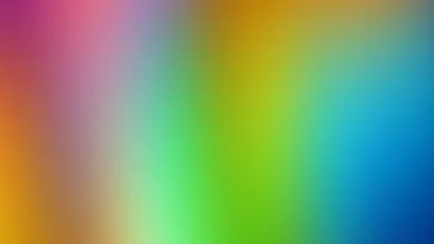 Unscharfer Farbverlauf von Magenta links oben über Orange und Grün bis Blau rechts unten, ohne erkennbare Motive.