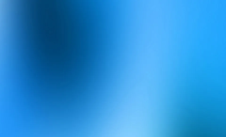Weich verschwommener Farbverlauf in Blau- und Türkistönen, dunkler links oben, hell und leuchtend rechts unten.