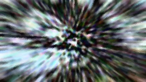 Abstrakte Komposition aus bunten, radial vom dunklen Zentrum nach außen laufenden Farbstreifen, pixelig verwischt