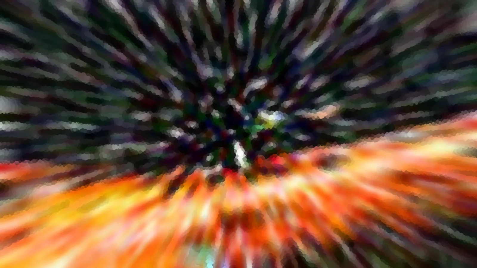 Abstrakte Aufnahme mit radialer Bewegungsunschärfe: Farbstreifen in Orange, Gelb und Rot laufen von unten rechts in einen dunklen, grün-violetten Mittelpunkt.