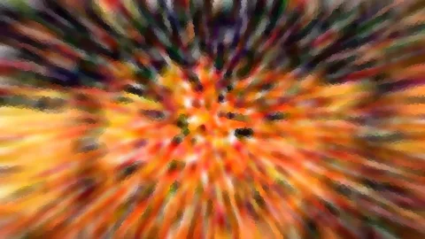 Abstrakte, radial von der Mitte ausgehende Streifen in Orange, Rot und Gelb mit dunklen Akzenten, mosaikartig verpixelt.