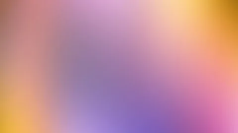 Unscharfer Farbverlauf von Lila über Rosa bis Orange und Gelb, diagonal von unten links nach oben rechts