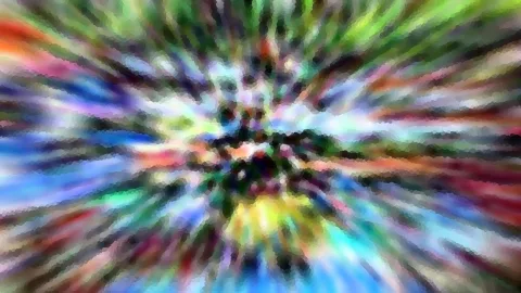 Bunte Farbstrahlen laufen radial von einem dunklen Zentrum in der Bildmitte nach außen, mit mosaikartiger Pixelstruktur.