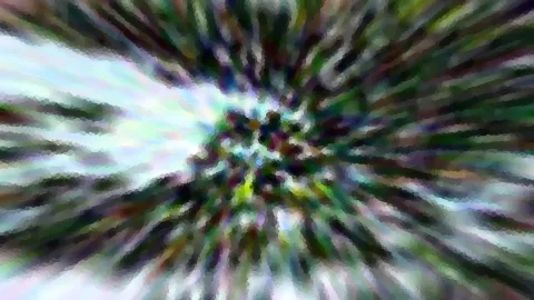 Abstrakte, radial verwischte Komposition aus grünen, weißen und dunklen Farbstreifen, die von einem zentralen Punkt nach außen strahlen.