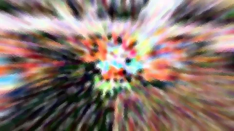 Abstraktes Bild mit radial von der Mitte nach außen laufenden, bunten Streifen in Rot, Orange, Grün, Blau und Weiß, zur Mitte hin heller und grobkörnig gepixelt.