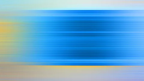Horizontal verlaufende blaue Streifen in der Bildmitte, links gelblich, oben und unten hell graugrau.