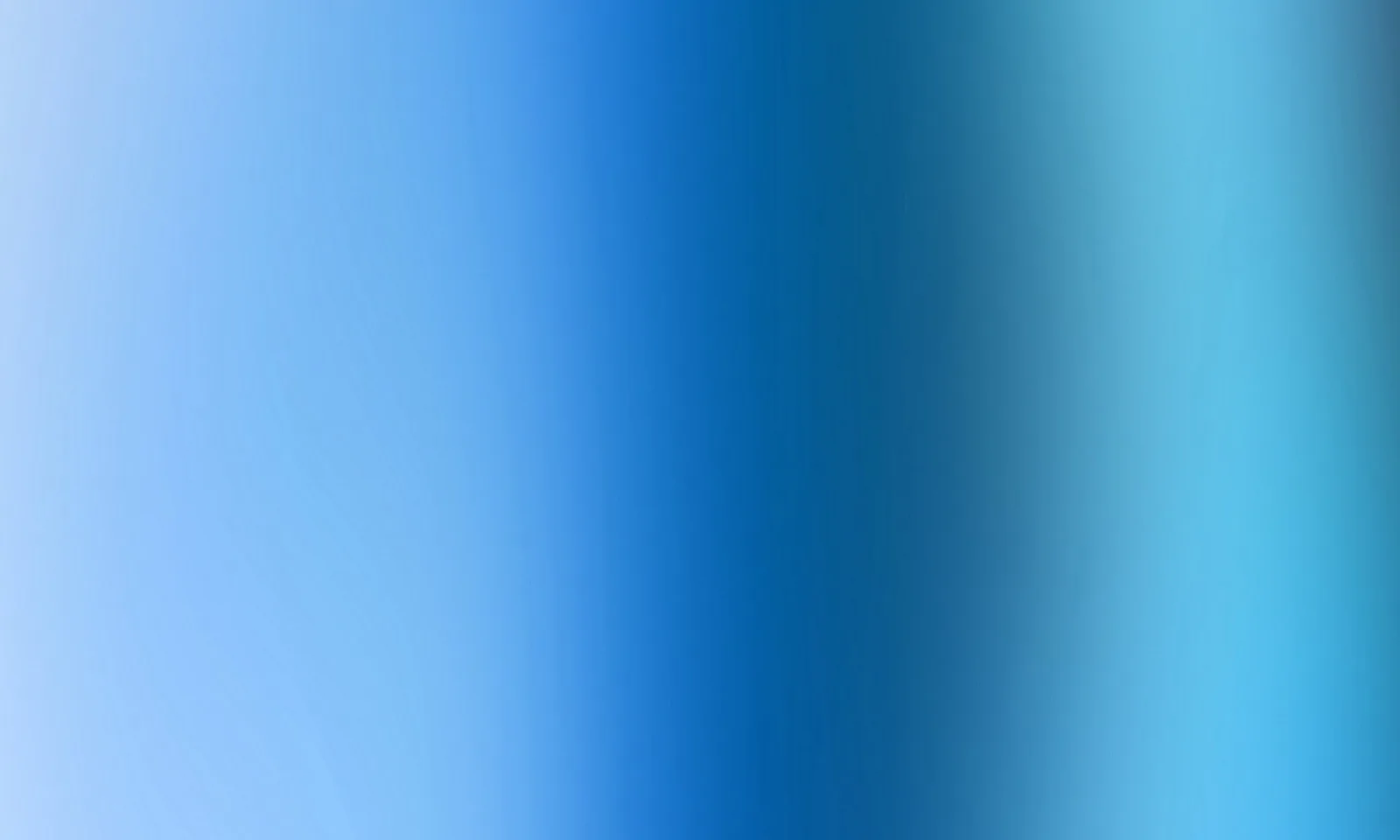 Horizontaler Farbverlauf von hellblau links über kräftiges Blau bis zu einem dunkleren Blaugrau und Türkis rechts.