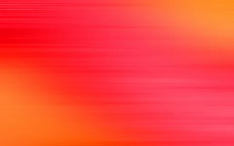 Horizontal verwischte Streifen in Rot und Orange, die von links unten nach rechts oben ineinander übergehen.
