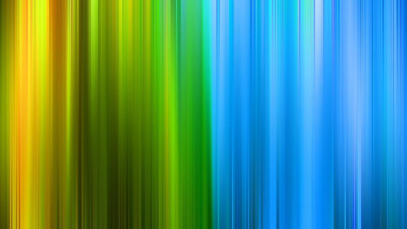 Abstraktes Bild aus senkrechten, verwischten Streifen: links gelb und orange, in der Mitte grün, rechts blau.